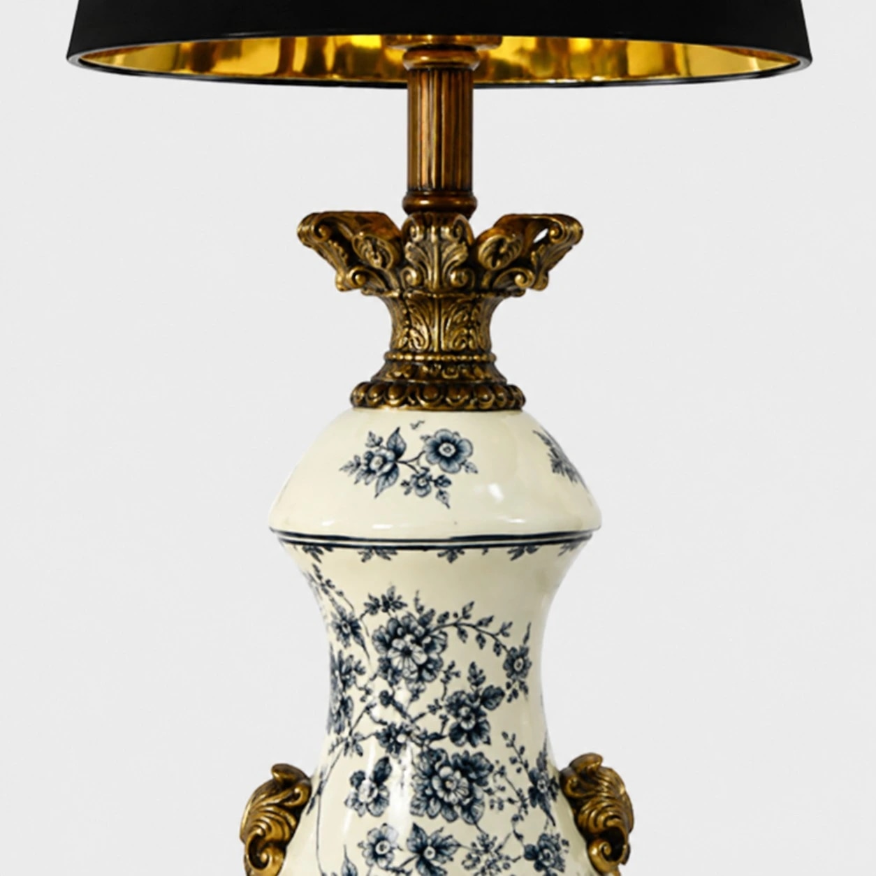 Blue porcelain motif body and carved brass tone detail