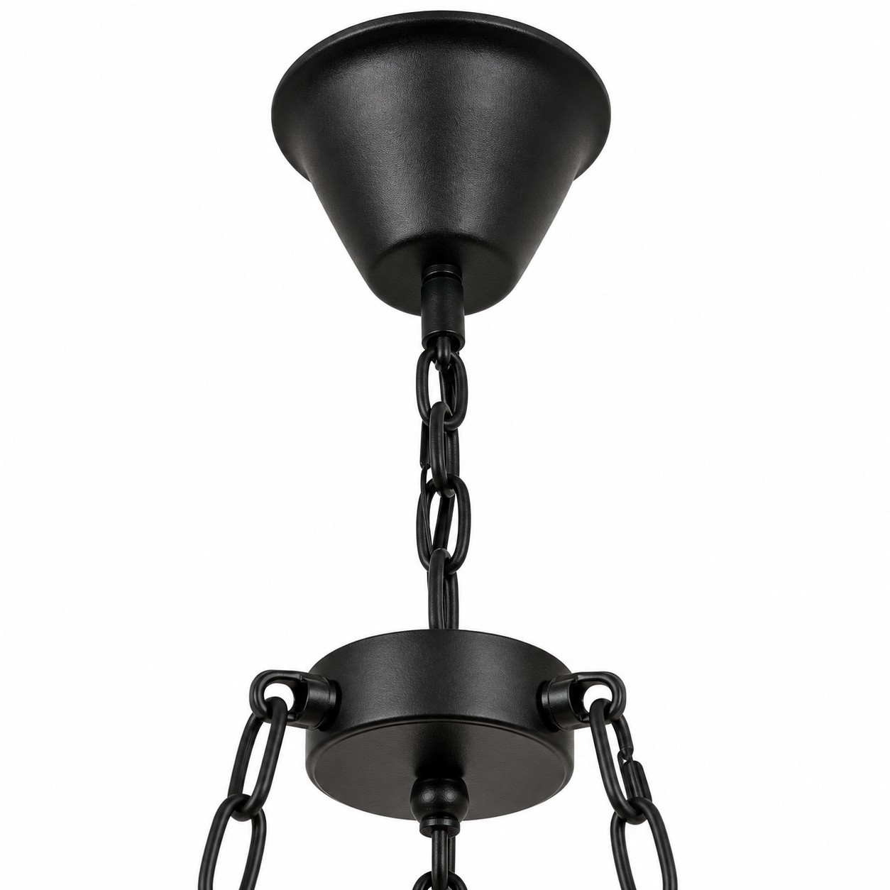 Close-up of black ceiling canopy and adjustable chandelier chain