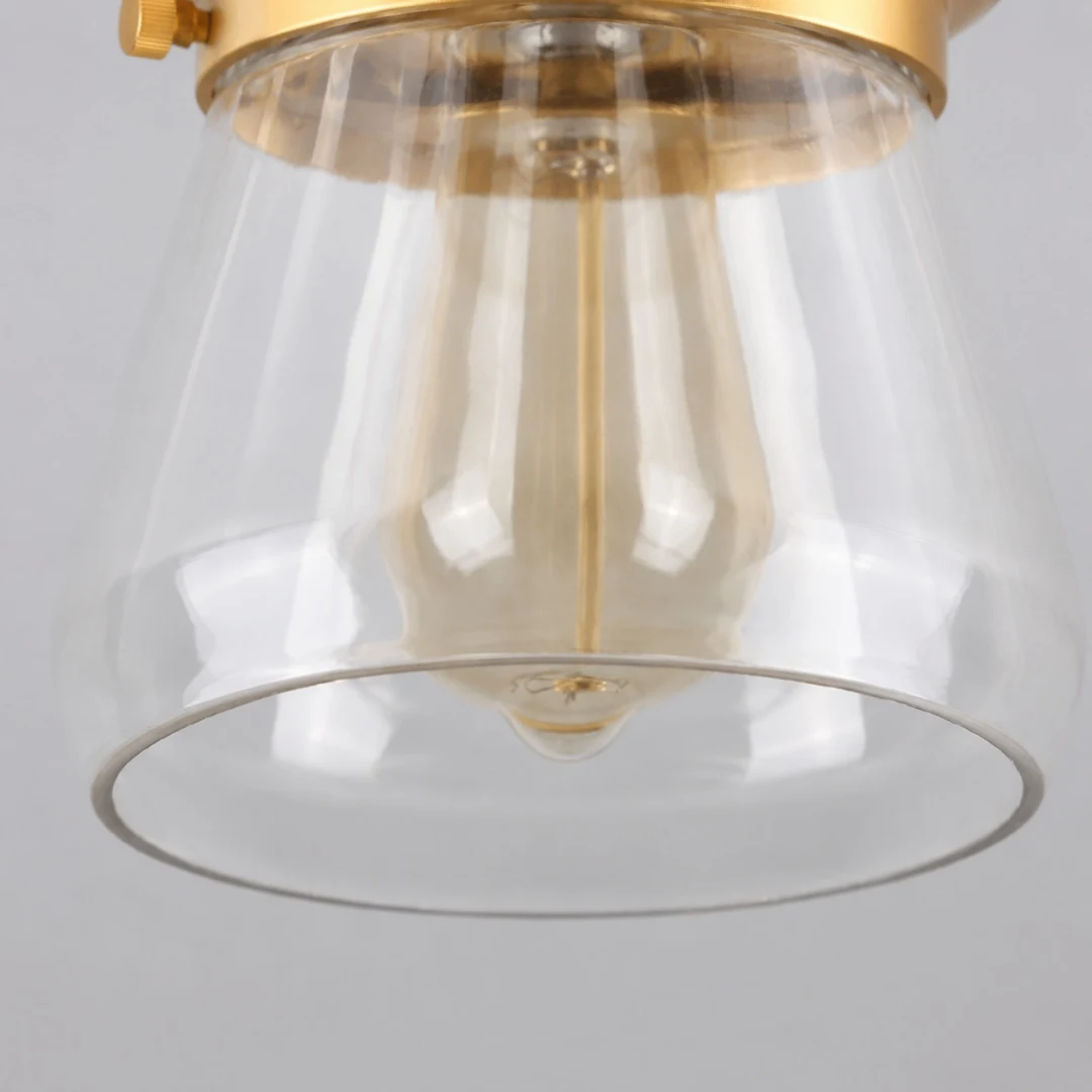 Klar glasskärmkant och detalj på glödlampsöppningen